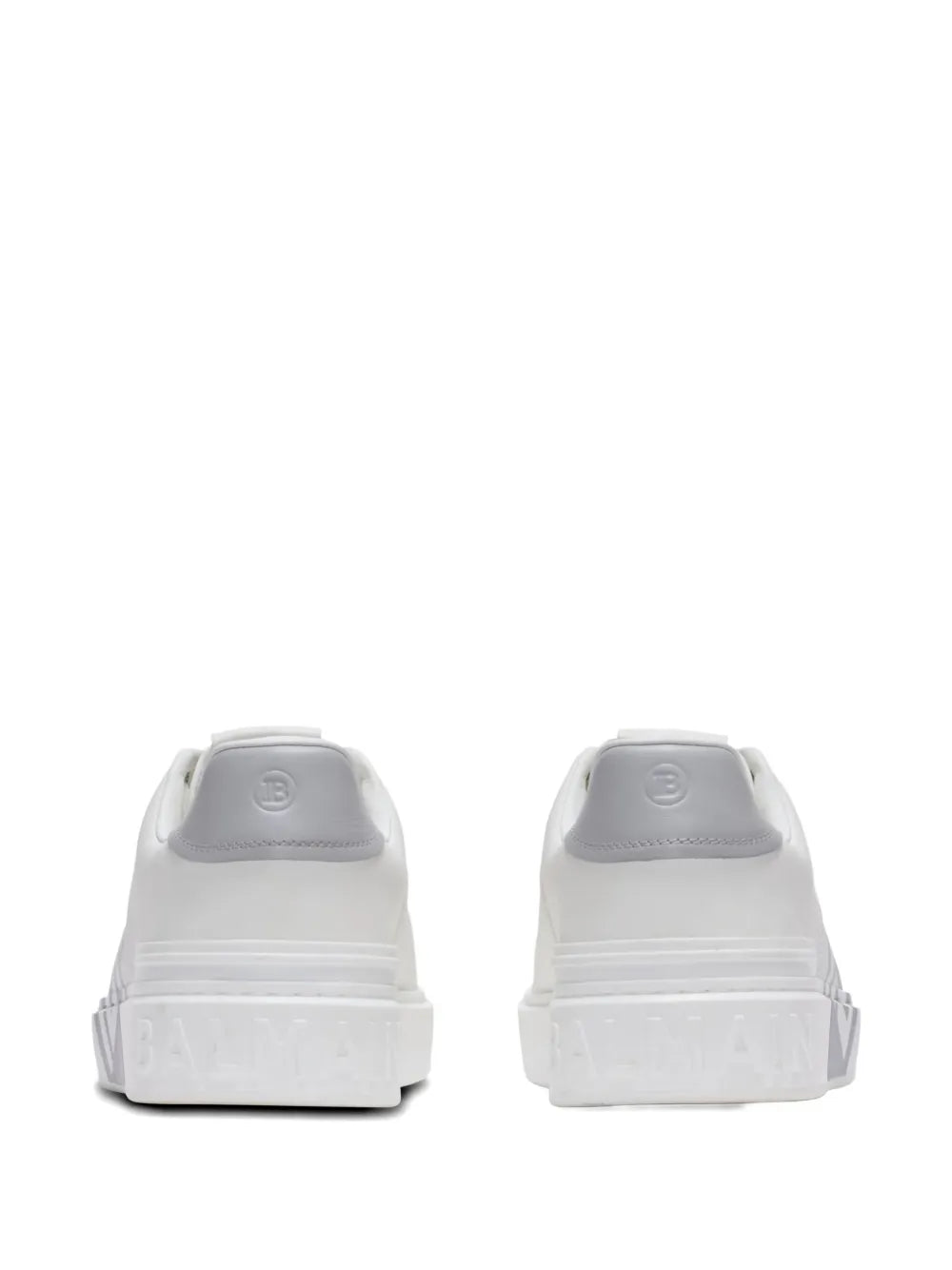 White calfskin sneakers rear view with branded heel tab and rubber sole