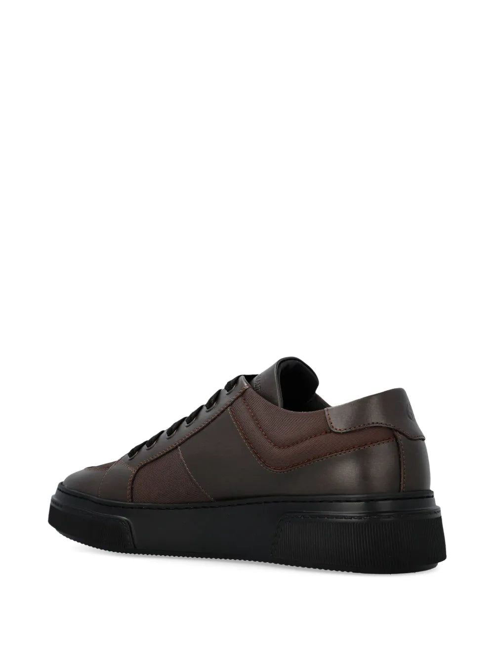 Brown leather sneakers with side panel detailing and black rubber sole