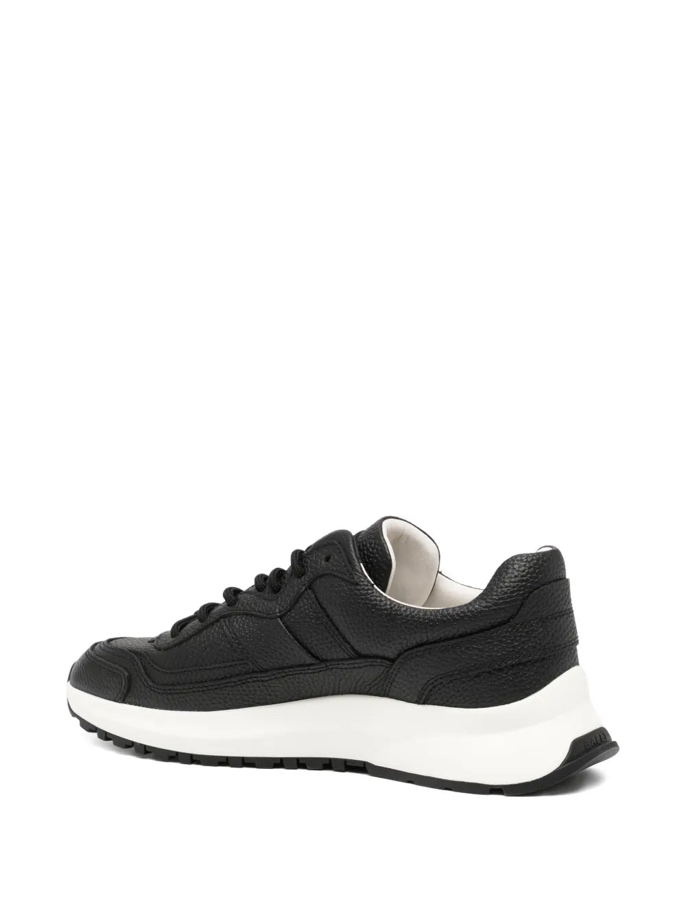 Black leather sneakers with sidewall stitching and white rubber sole