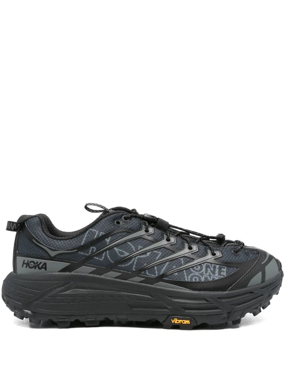 Men's dark gray trail sneakers with Hoka wordmark on side and lug sole