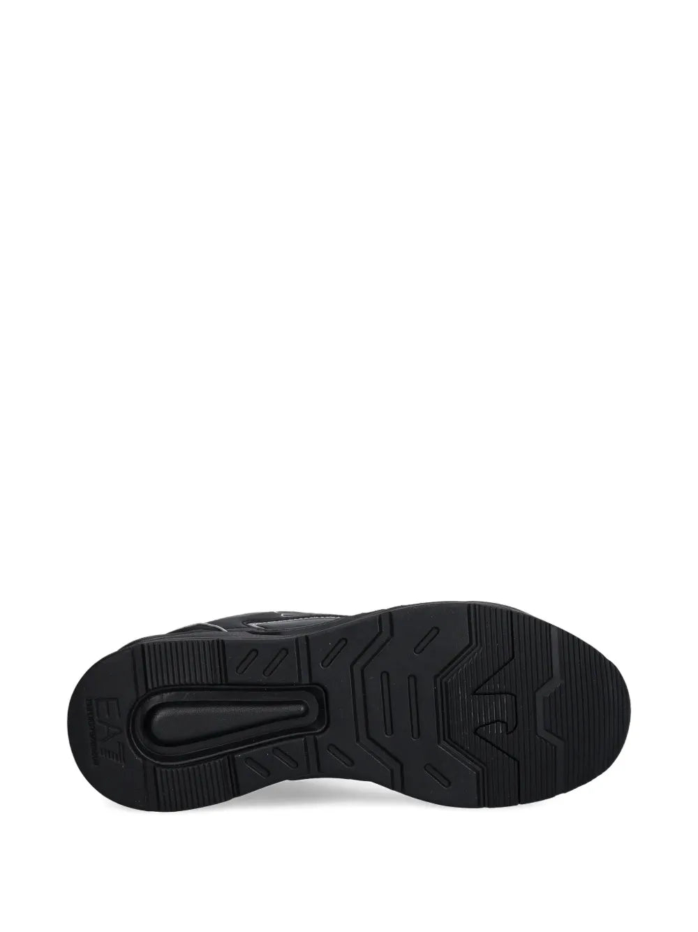 Black sneaker outsole with deep tread pattern