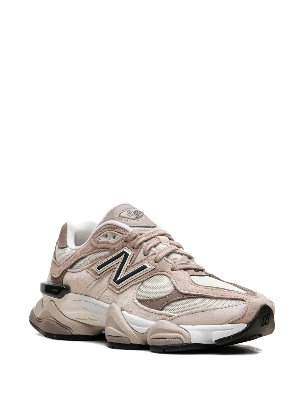 Beige lace-up sneakers with New Balance 'N' logo and black heel tab, chunky sole.