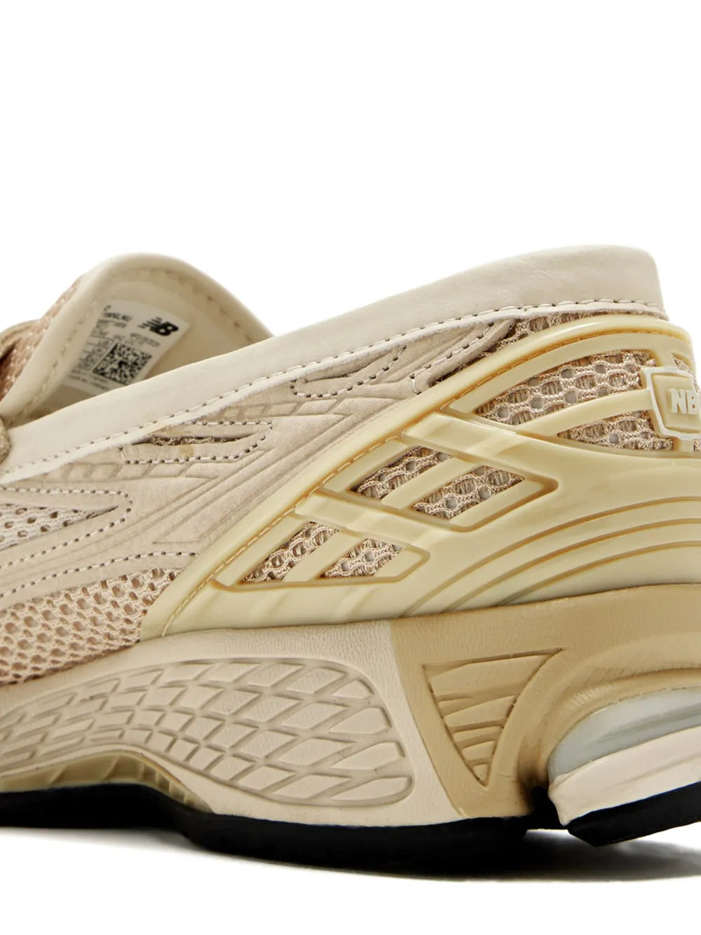 New Balance U1906L beige sneaker side detail, patterned overlays and cushioned sole