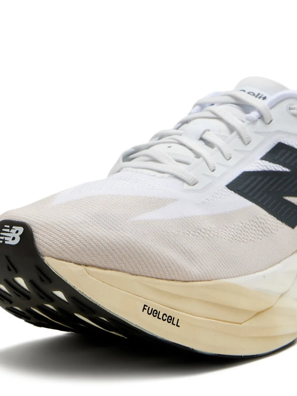 White sneaker close-up with black side panel and FuelCell branding on sole