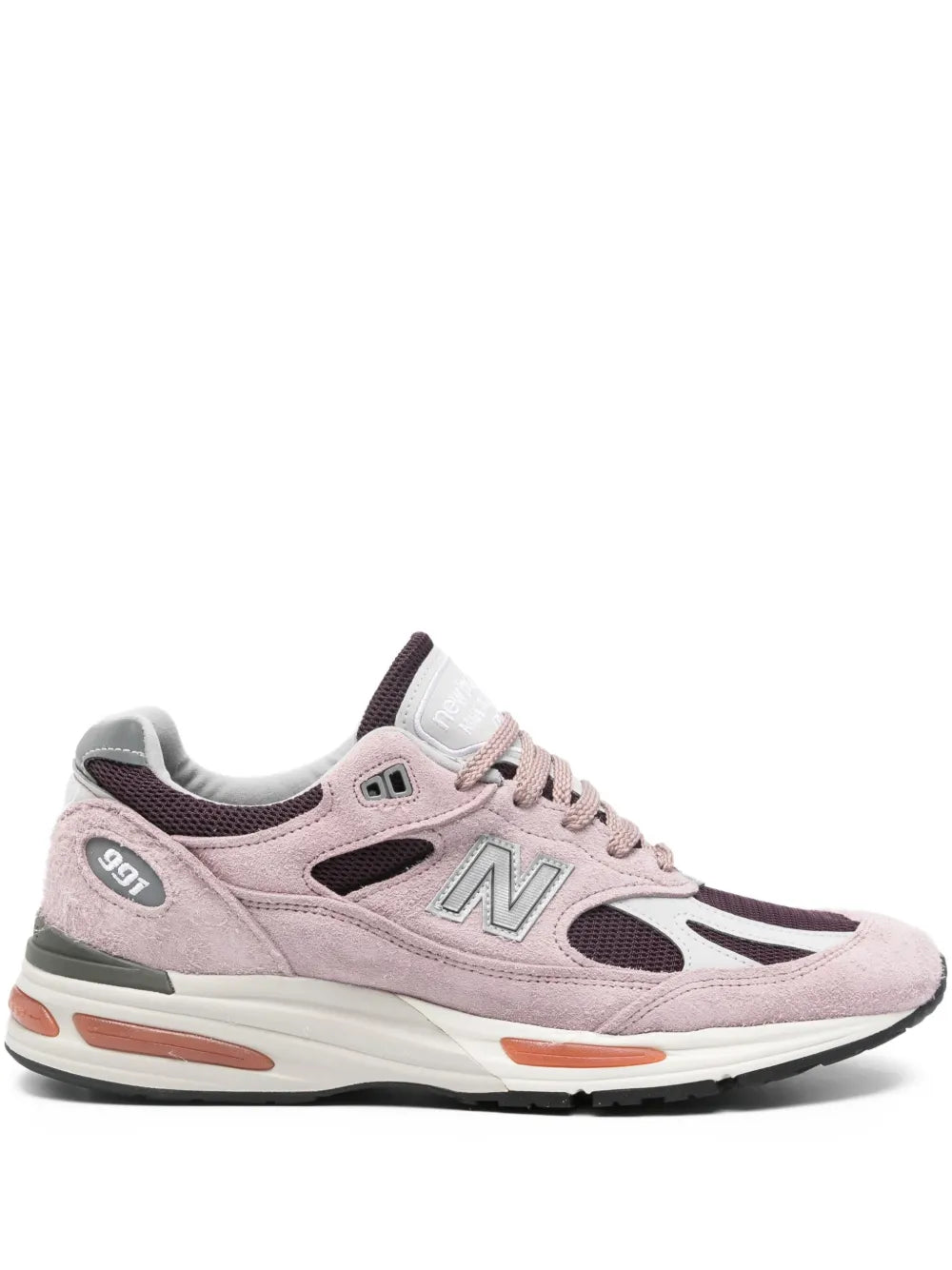 Pink suede New Balance 991 sneakers with N logo, lace-up and cushioned sole