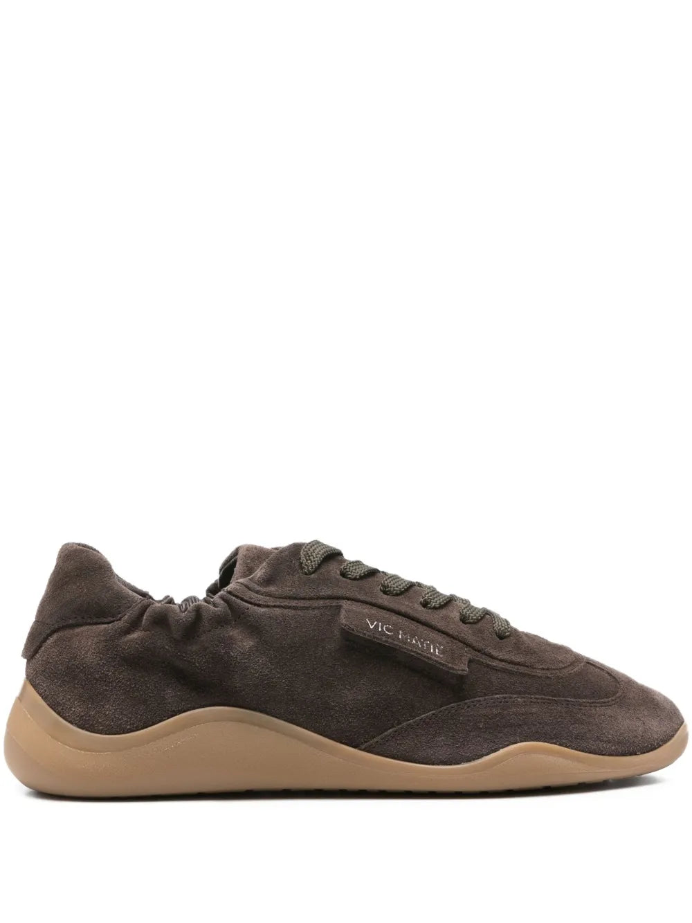 Dark brown suede lace-up trainer with beige rubber sole