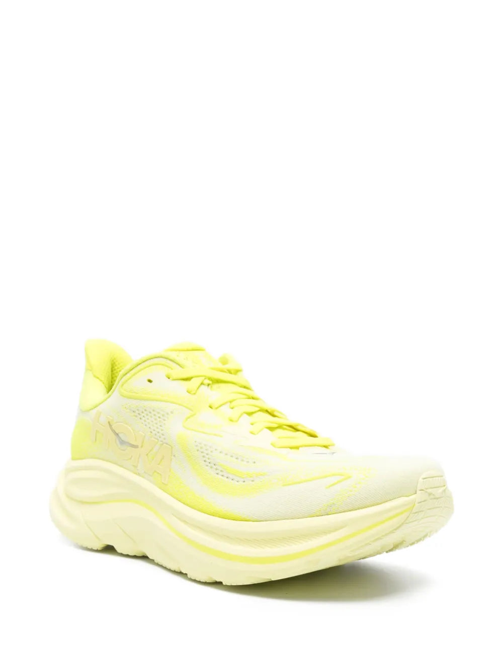 Neon yellow lace-up mesh trainer with curved sole and textured side panels