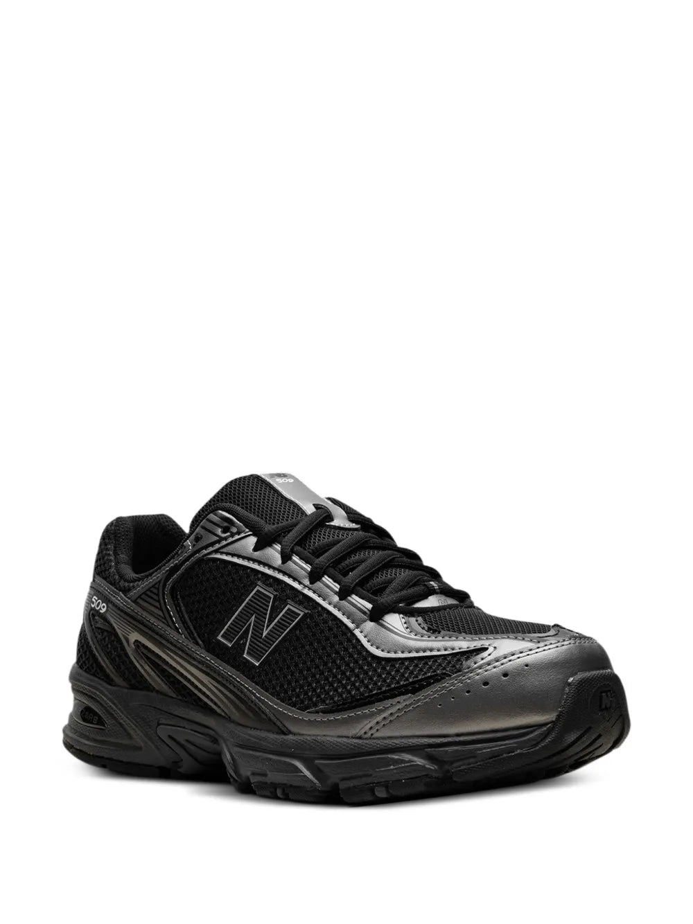 Black New Balance 509 sneakers, silver accents, padded tongue and lace-up