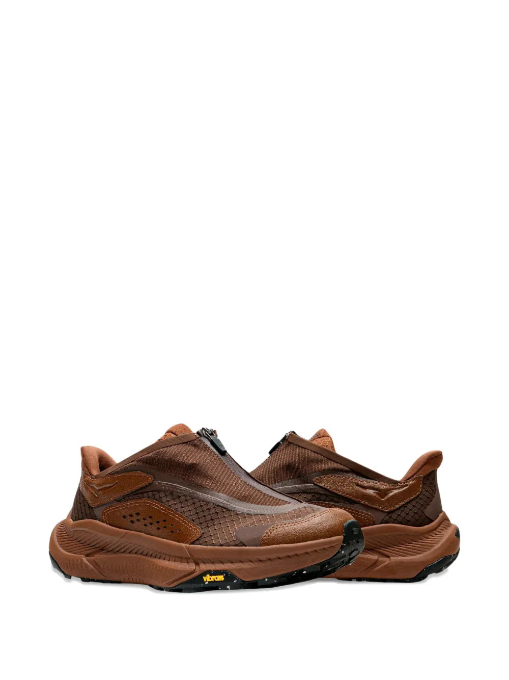 Hoka brown zip-detail sneakers with suede overlays and sculpted tread sole