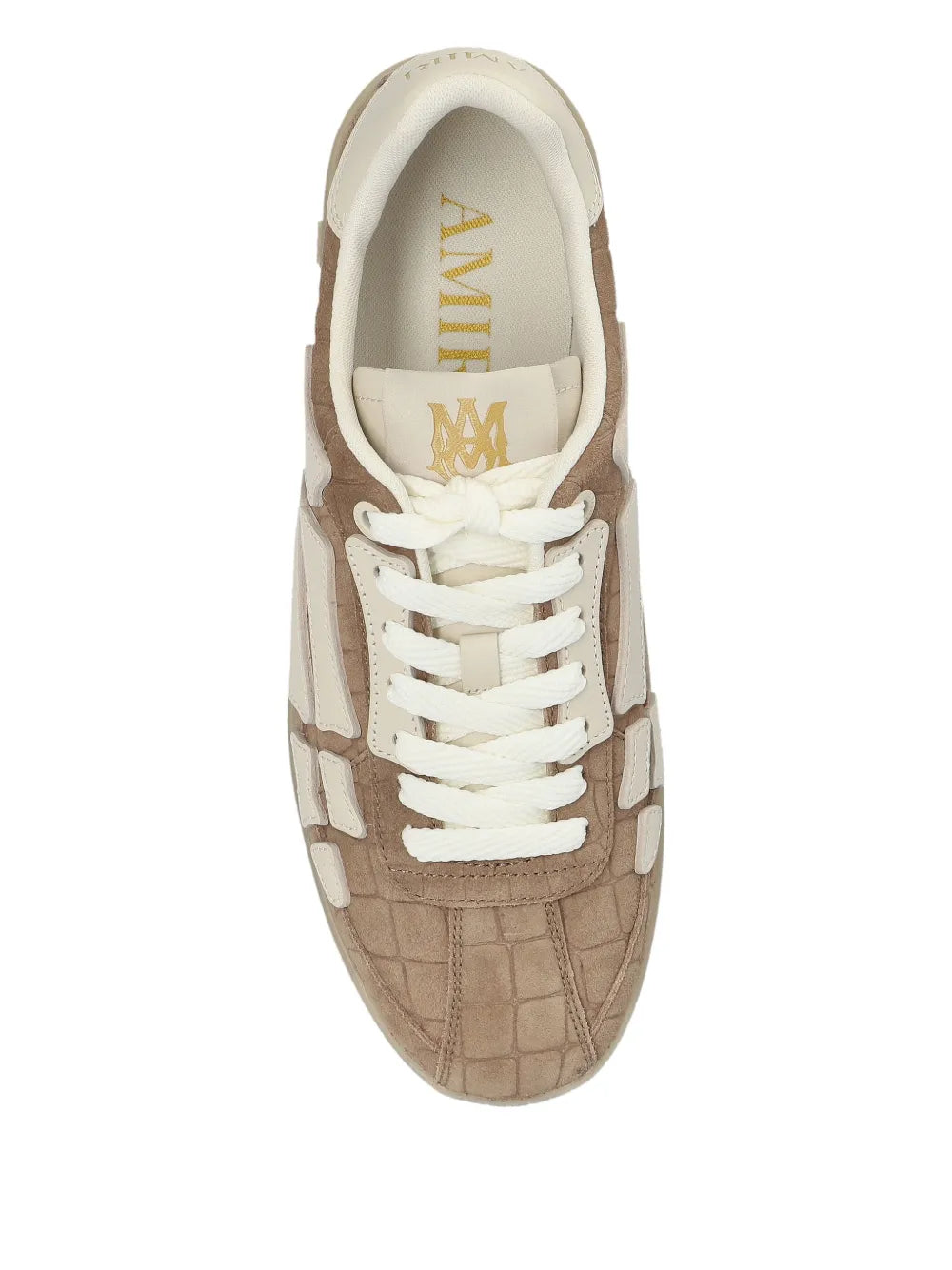 Light brown Amiri low-top sneakers with white laces and logo in the insole