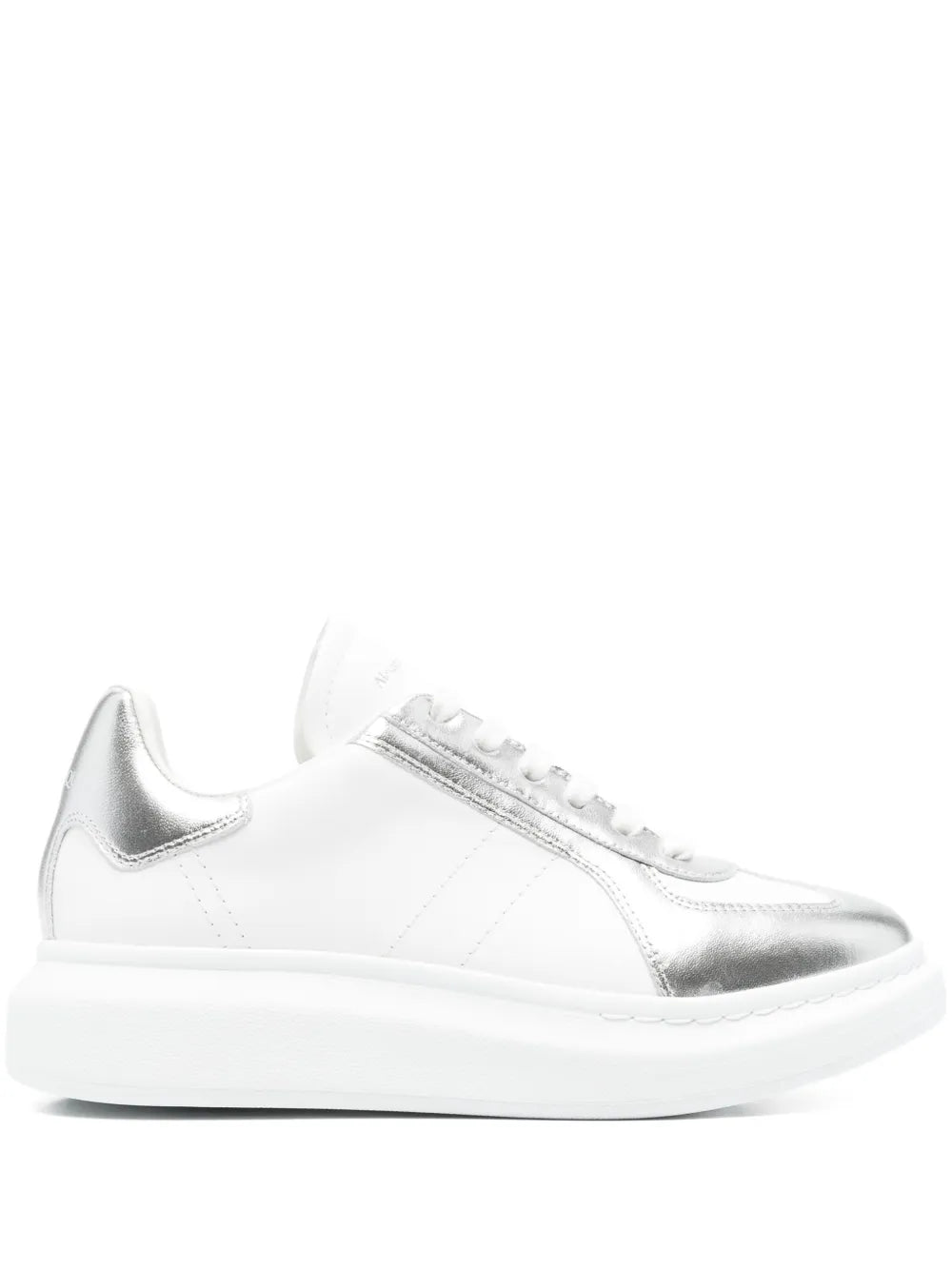 White leather lace-up sneakers with silver metallic panel and oversized rubber sole