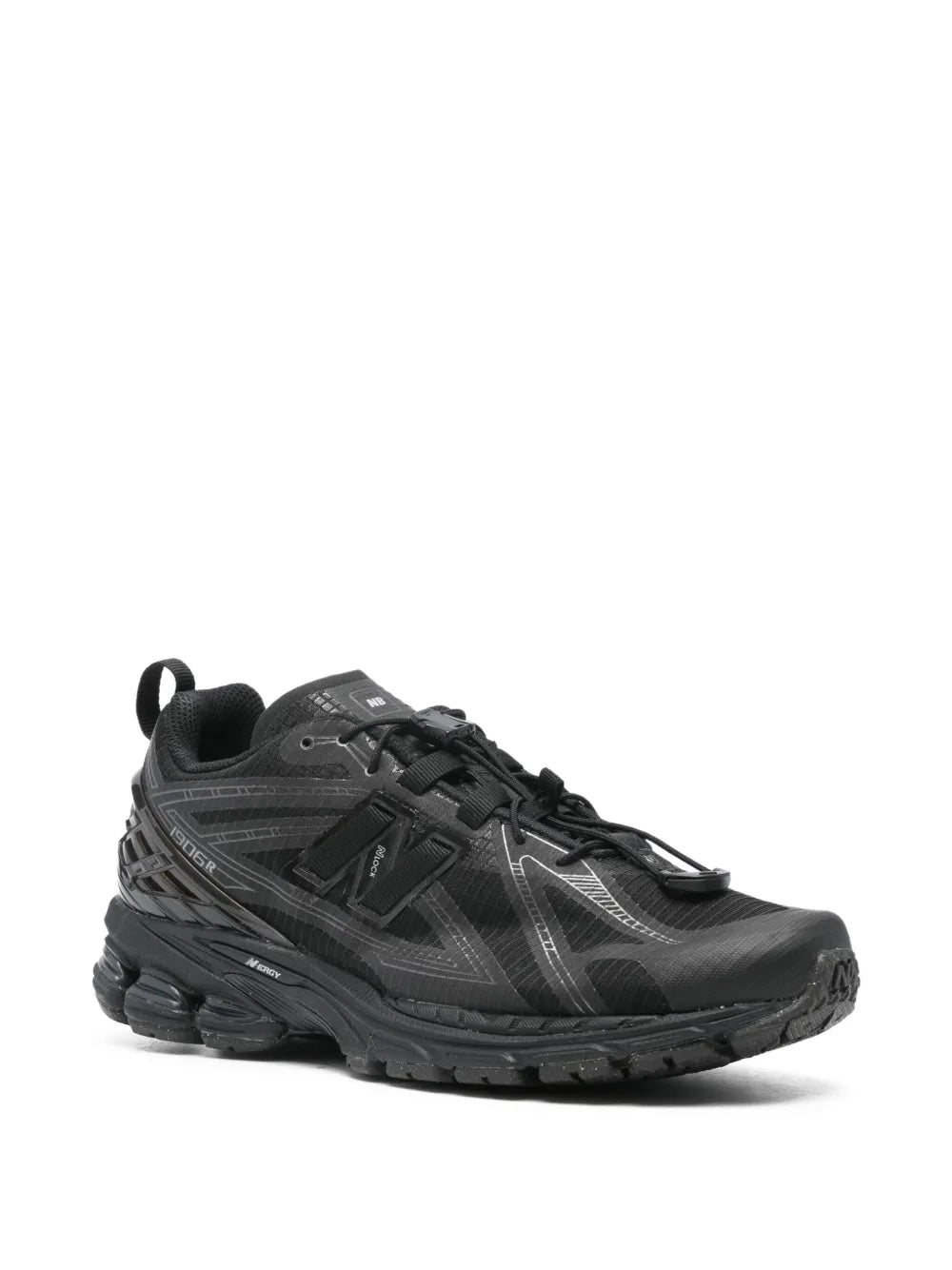 New Balance U1906 black lace-up sneakers with molded side panels and cushioned sole