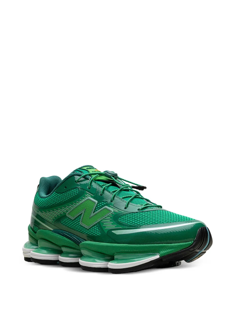 Green low-top lace-up sneakers, side view with N logo