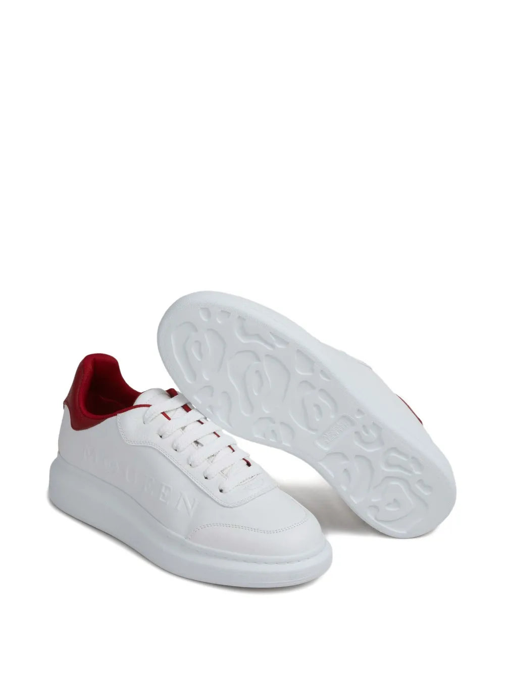 White outsole view of chunky trainers with embossed tread