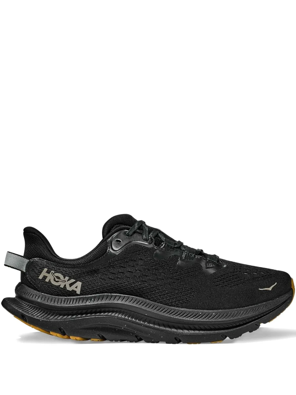 Hoka perforated-detail black sneakers with lace-up and chunky sole, side view.