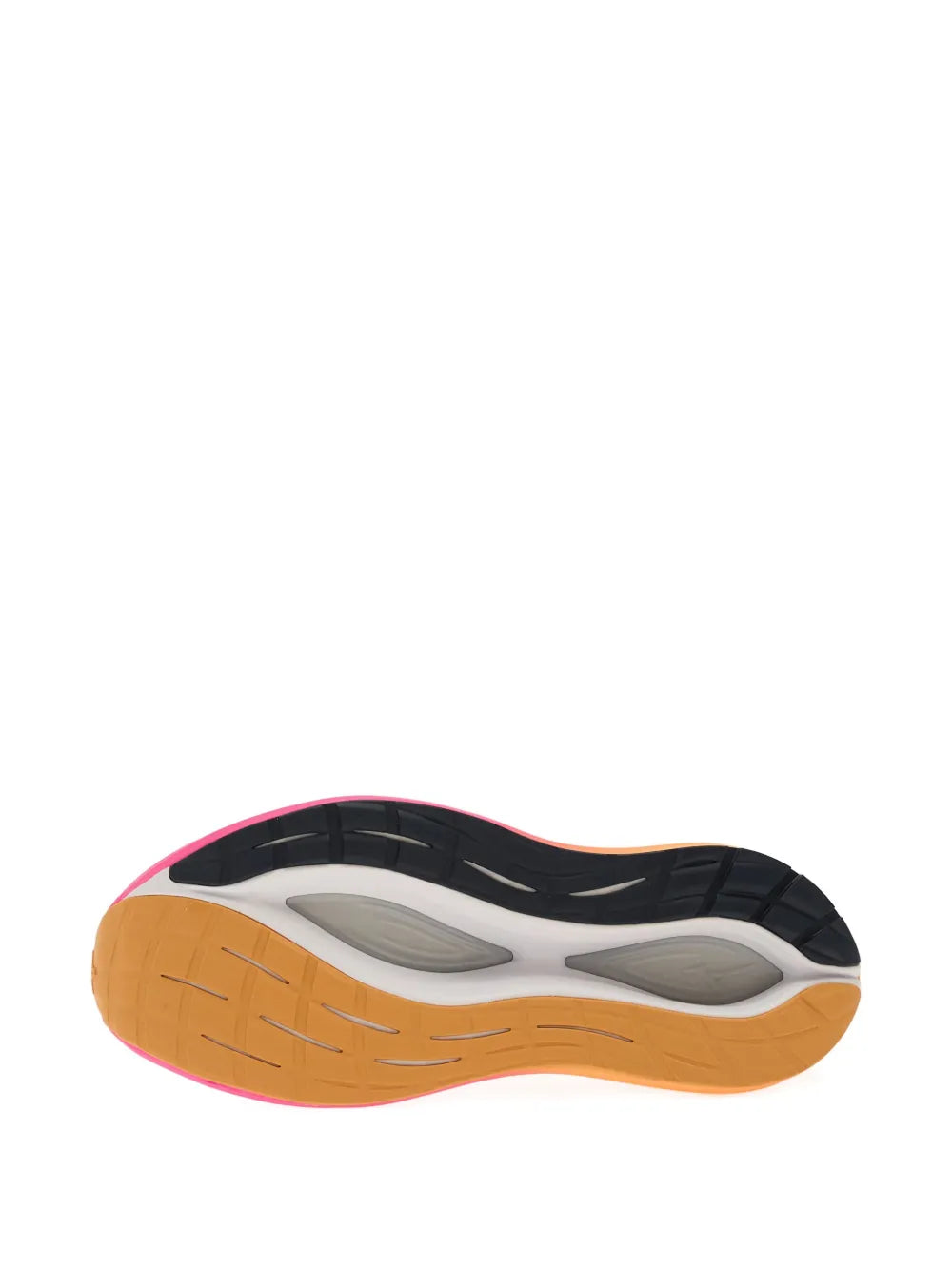Outsole view of white sneakers with orange tread and black grip details