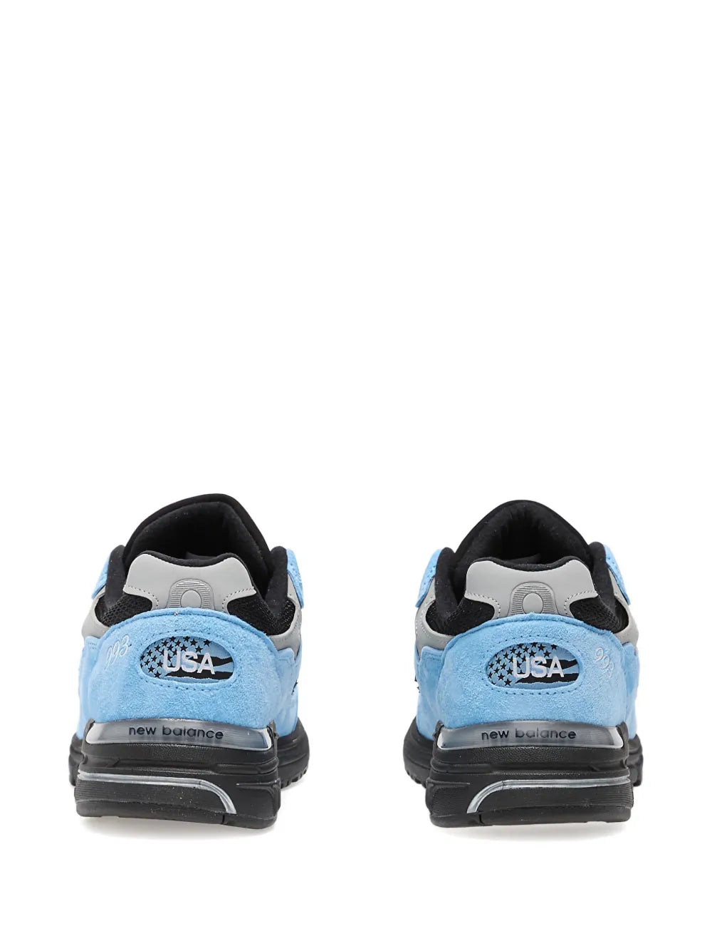 Blue and black suede sneakers with USA heel tab, New Balance 993 rear view