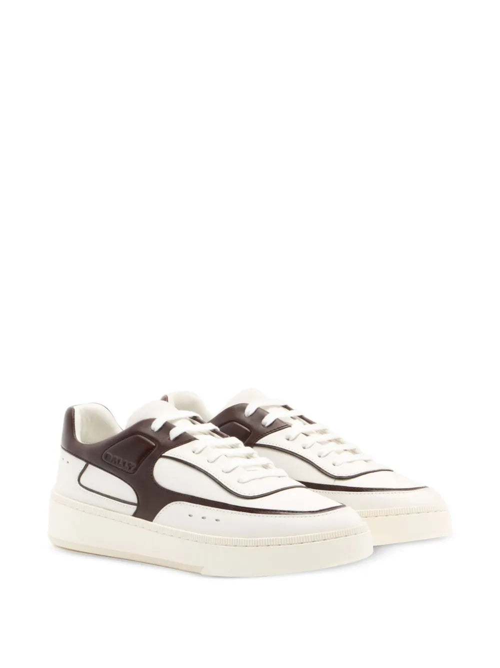 Pair of white leather sneakers with dark brown accents and white lace-up design