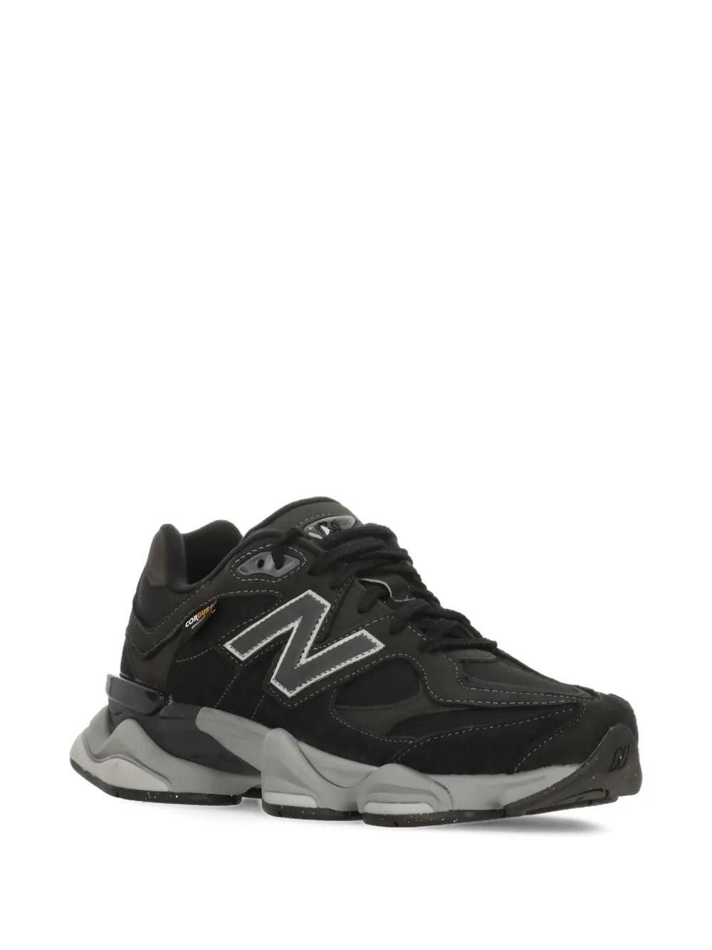 Black lace-up sneakers with large silver N logo and gray midsole