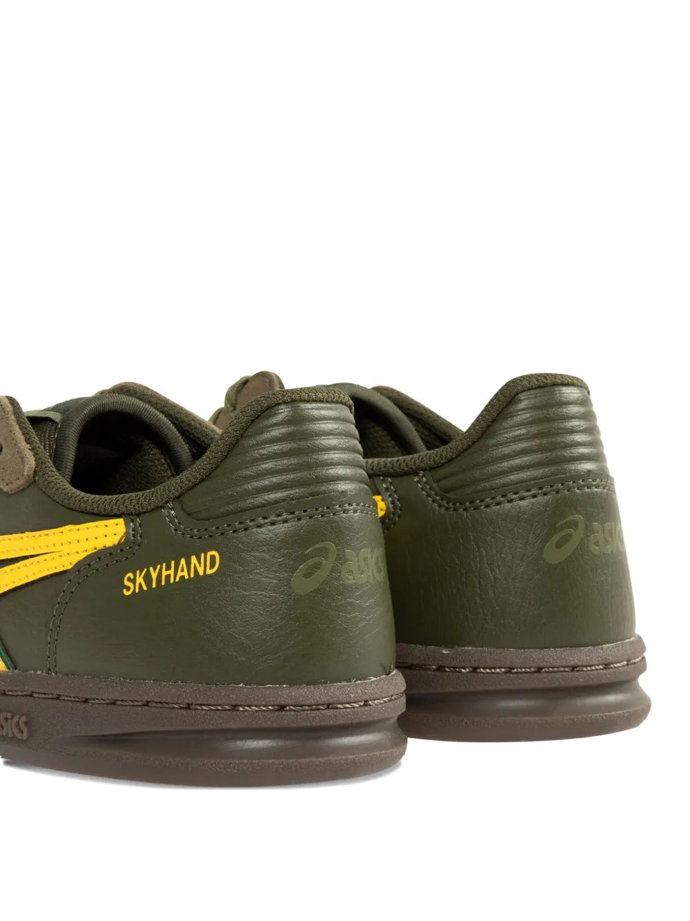 Olive sneakers heel close-up with yellow detail, lace area, ASICS logo