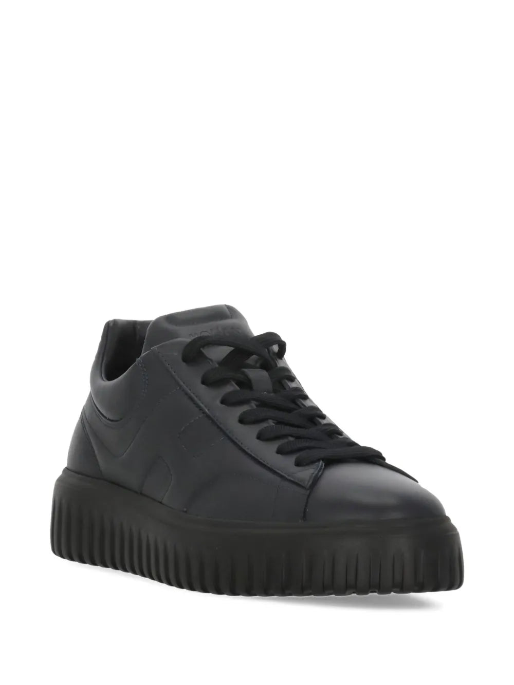 Hogan quilted black lace-up sneakers, angled side view with textured rubber sole