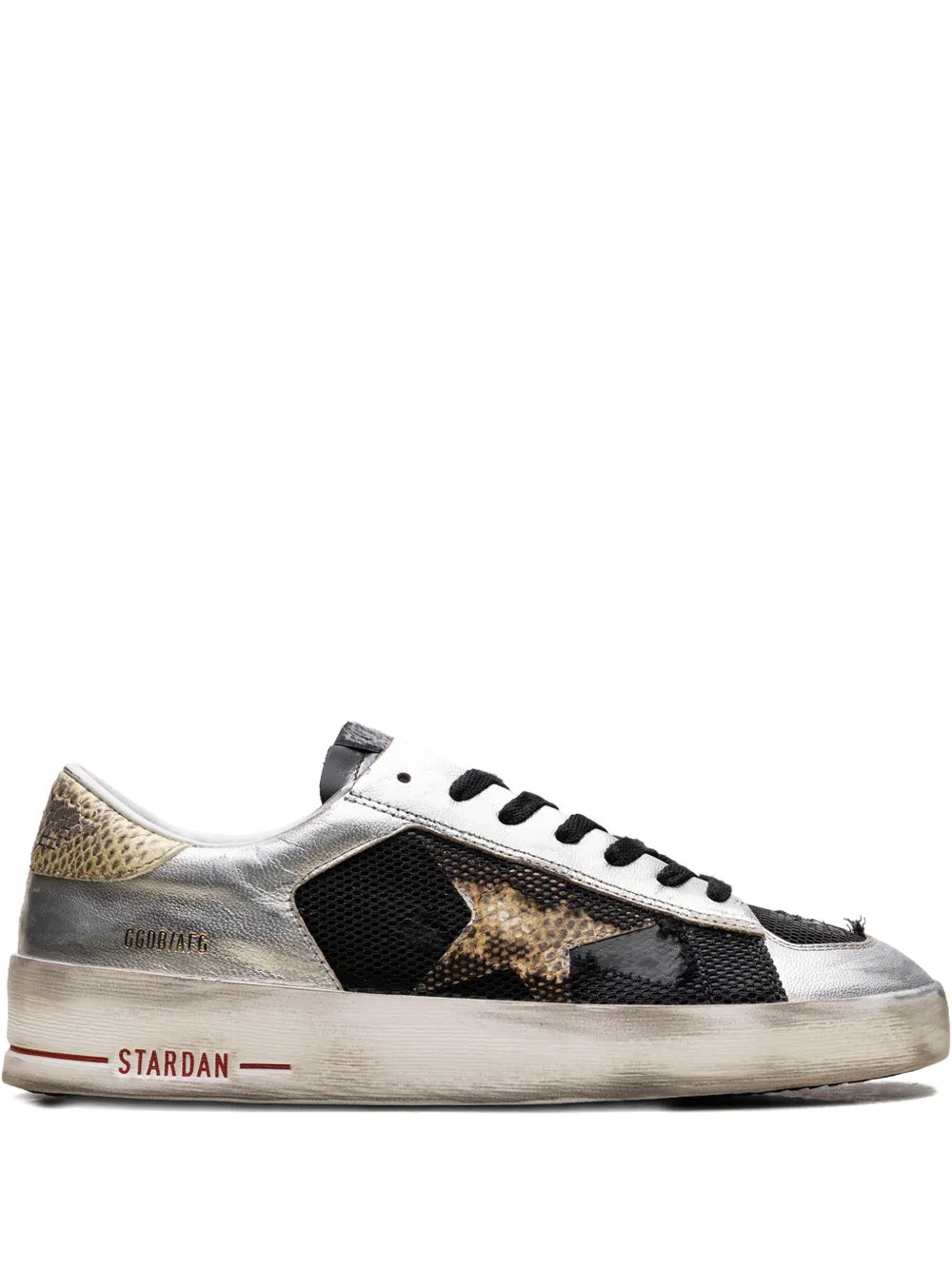 Silver and black low-top sneakers with black side panel and speckled gold detail