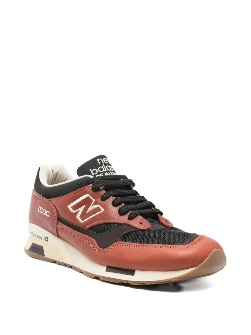 Orange and black New Balance 1500 lace-up sneakers, side view with 1500 label