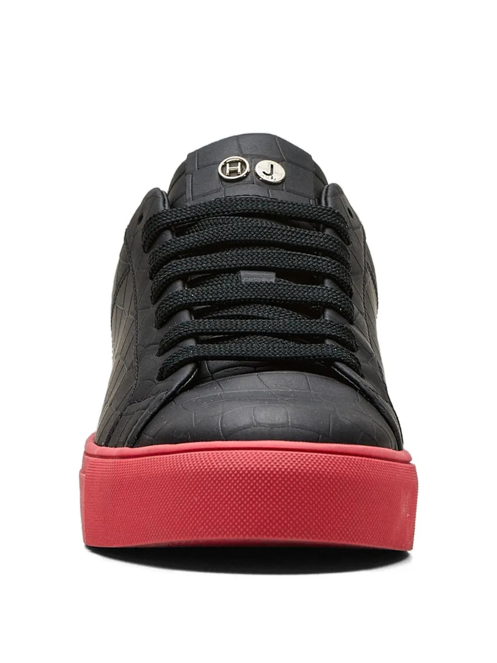 Black lace-up sneakers with red sole, front view, emblem on tongue