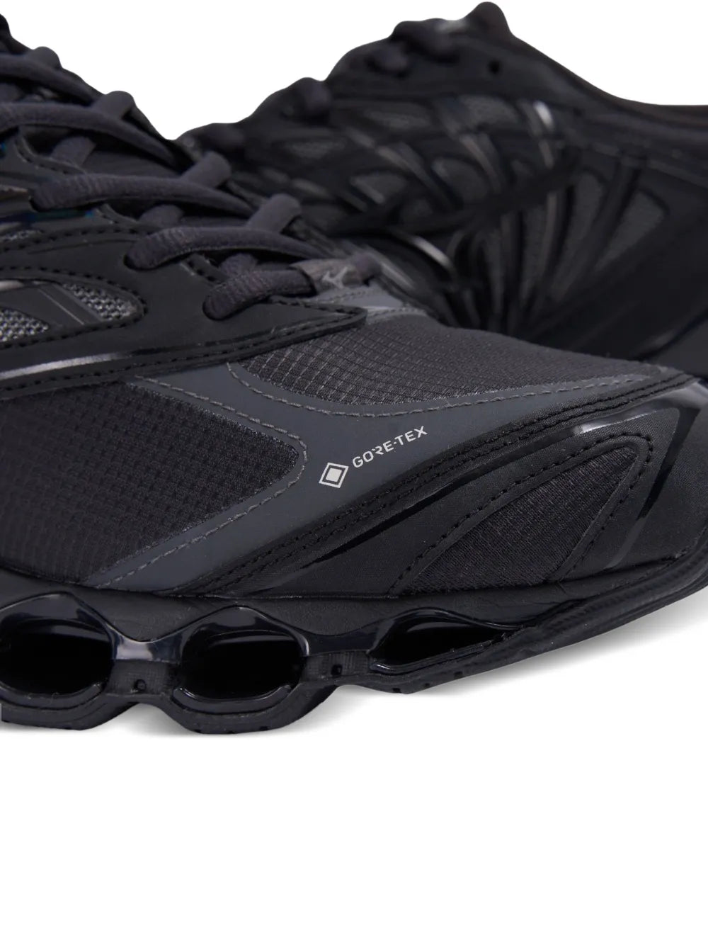 Black Mizuno sneakers with GORE-TEX logo and sculpted outsole with circular pods