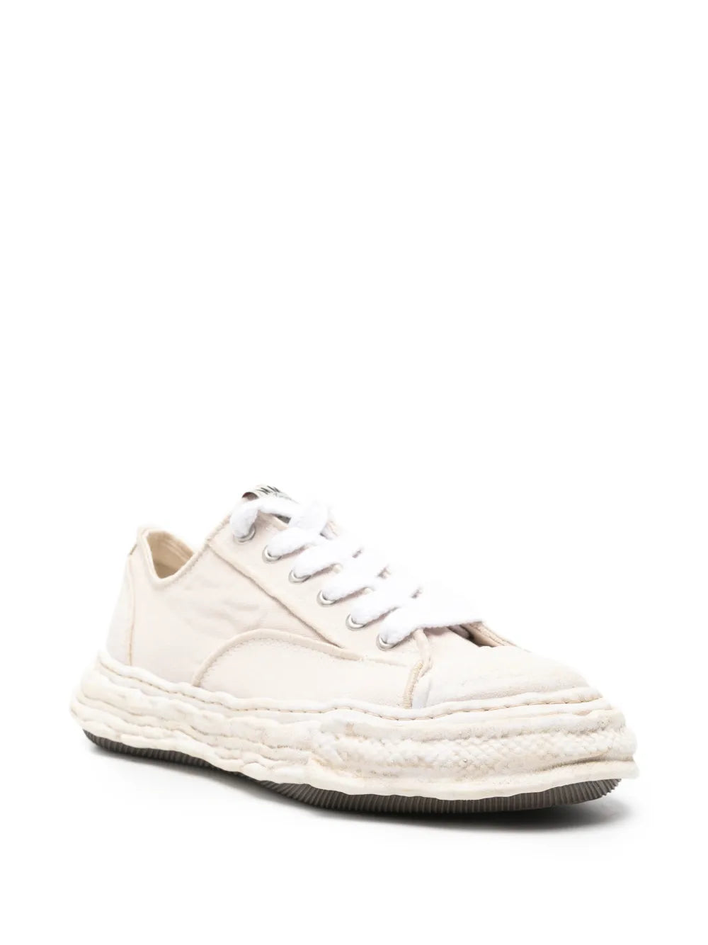 Beige distressed low-top sneakers, lace-up front and cushioned textured sole