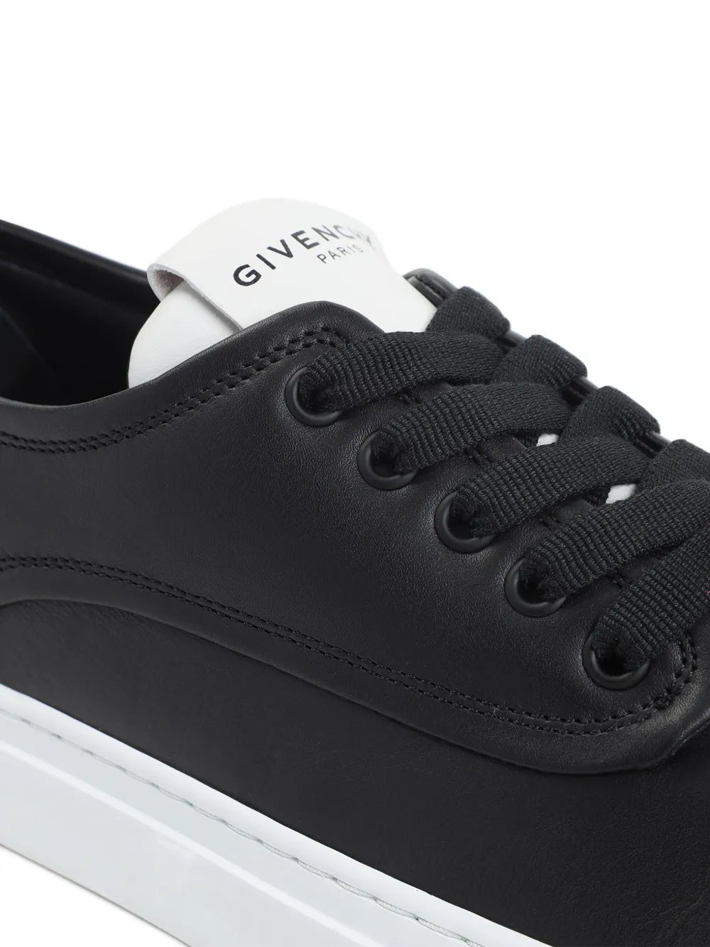 Givenchy black leather lace-up sneakers with GIVENCHY PARIS logo on tongue
