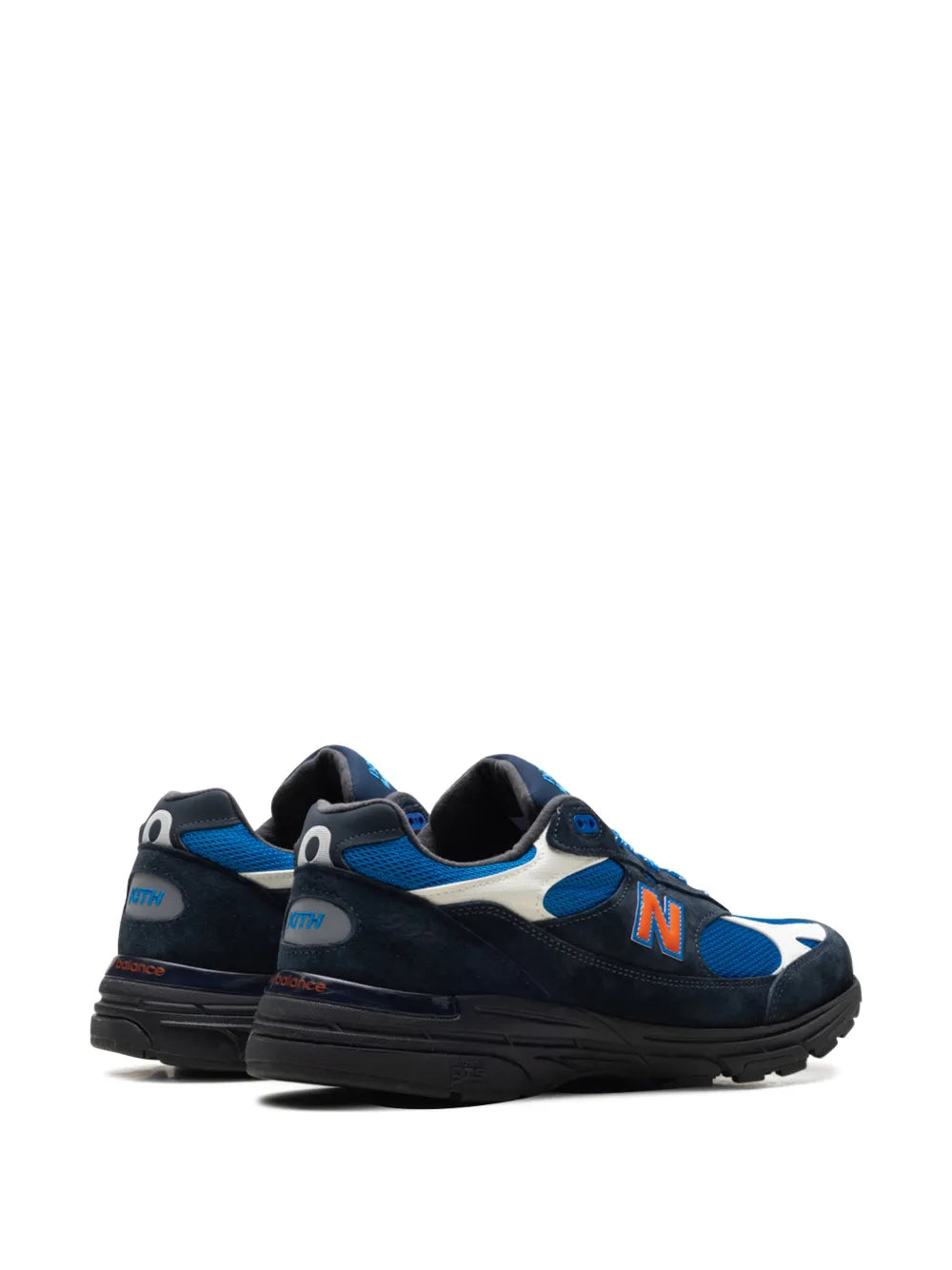 Pair of New Balance x Kith panelled sneakers in blue and navy with orange N detail