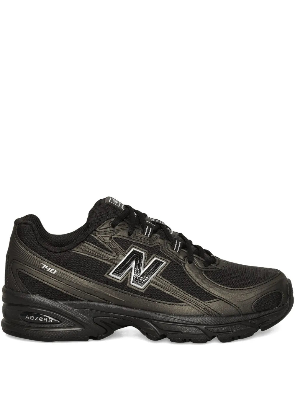 New Balance lace-up sneakers, dark black with large N logo and thick rubber sole