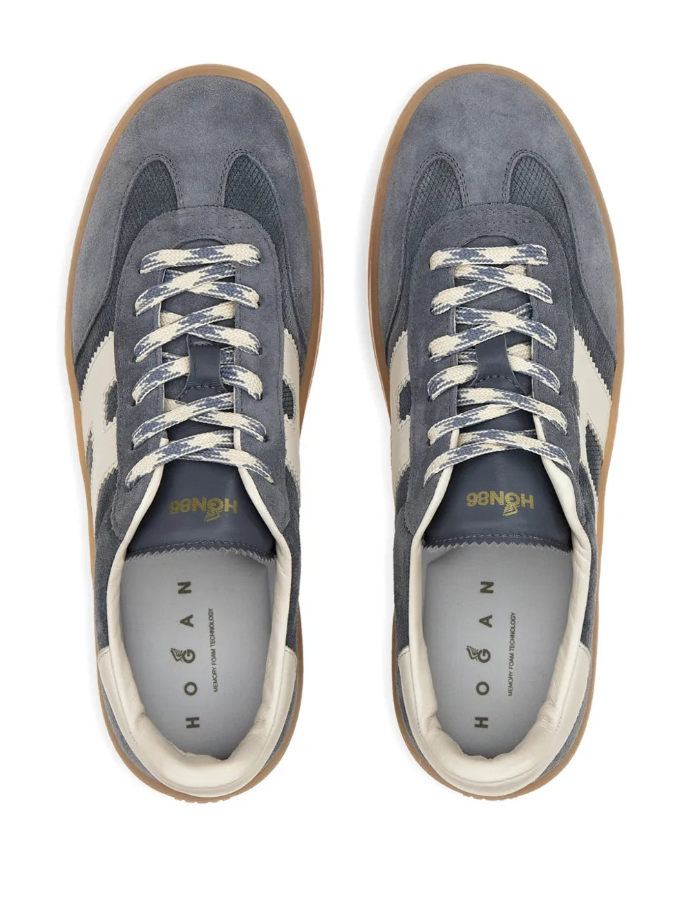 Hogan logo-patch sneakers showing tongue and insole text, dark blue with white stripe