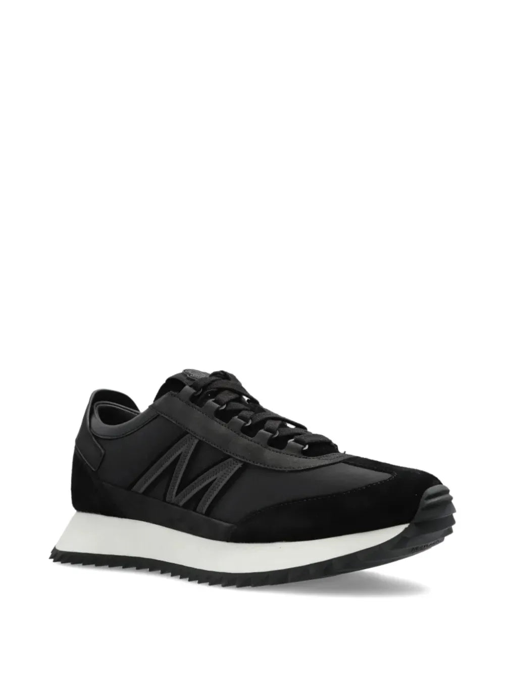 Black lace-up Moncler sneakers with panel detailing and thick ribbed sole