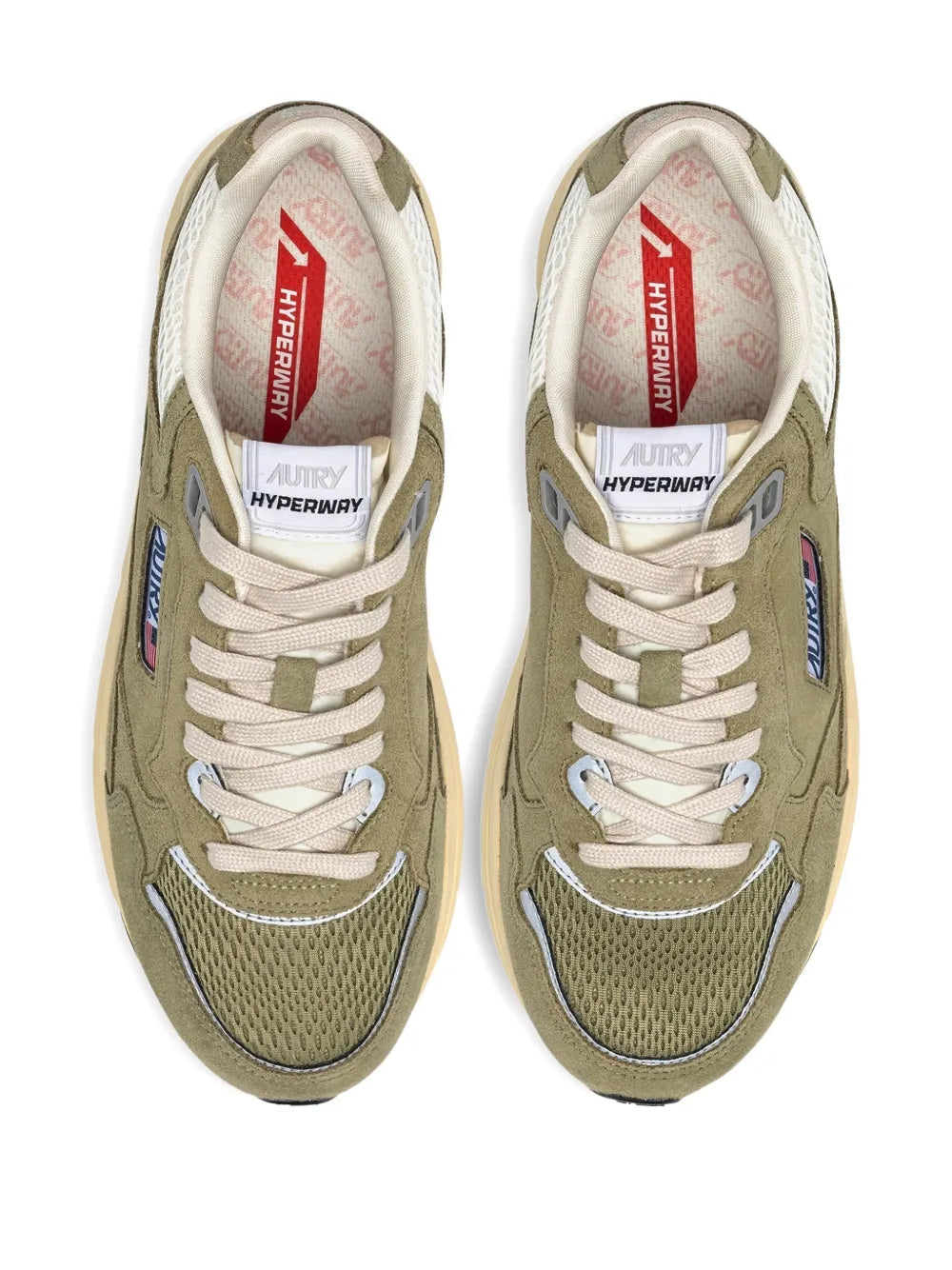 Pair of olive green suede sneakers showing white insoles and lace-up eyelets