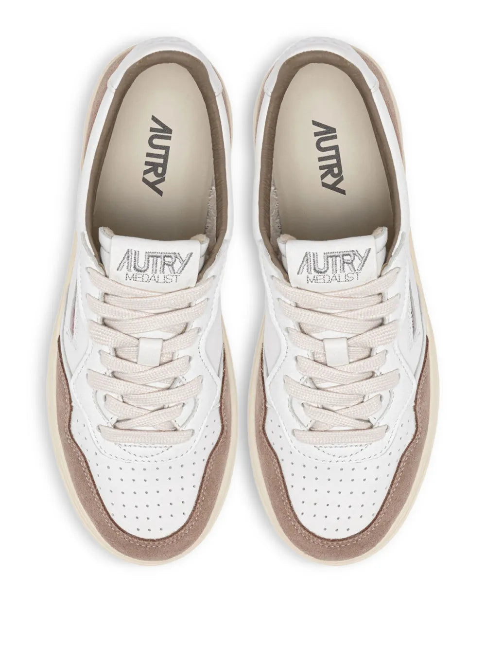 White sneakers with brown suede heel panels and front lace-up detailing