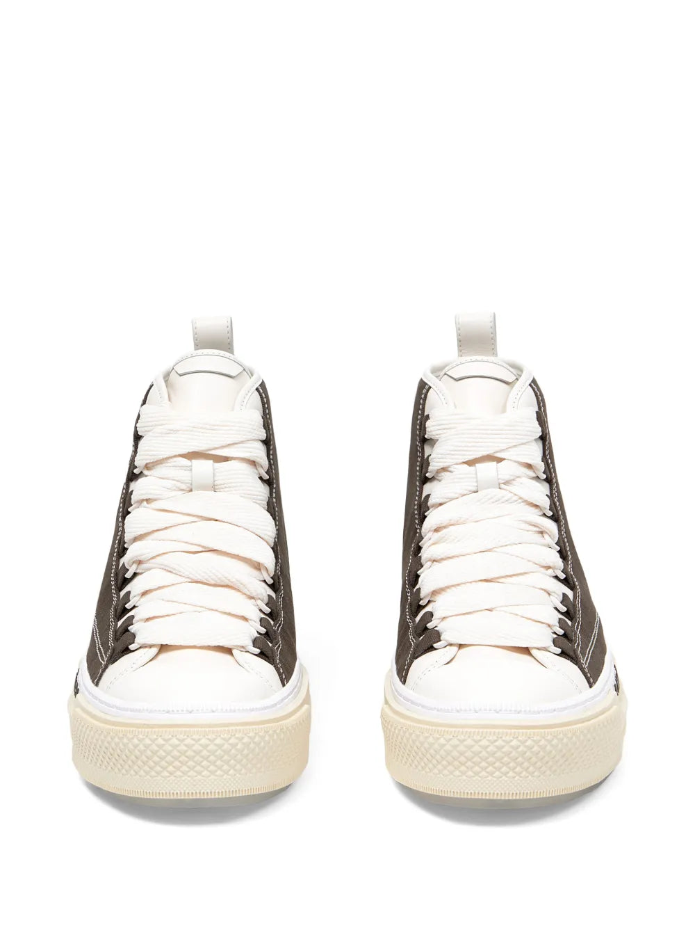 Front view of dark brown high-top sneakers with white laces and cream sole