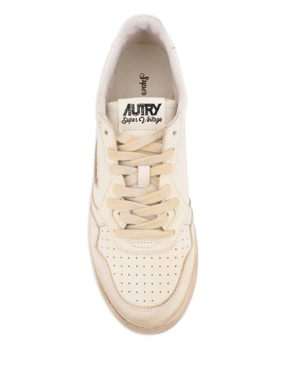 White sneakers with tongue lining logo and lace-up eyelets
