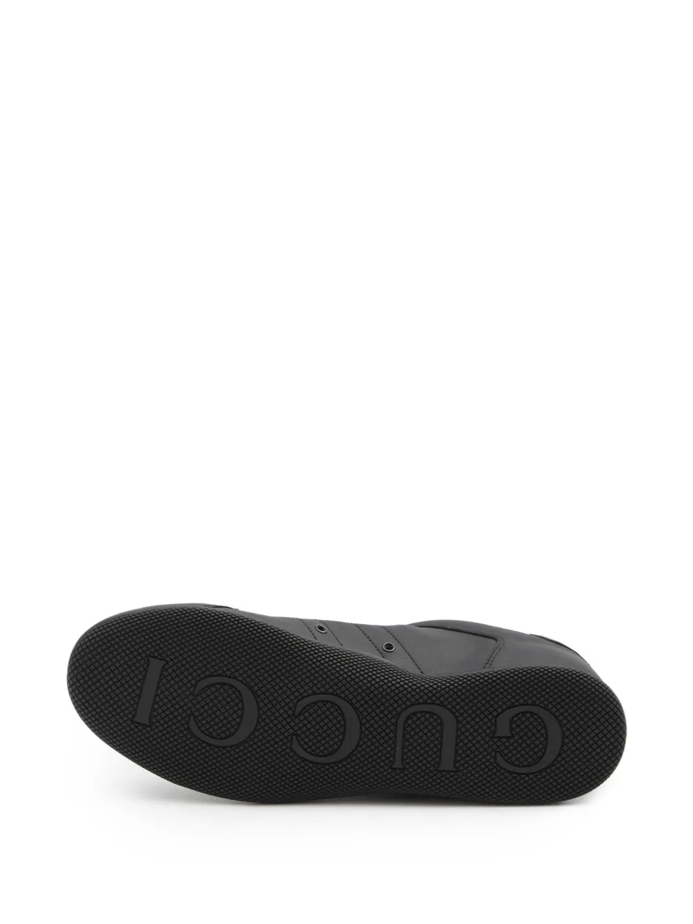 Gucci black rubber outsole with textured tread and raised logo