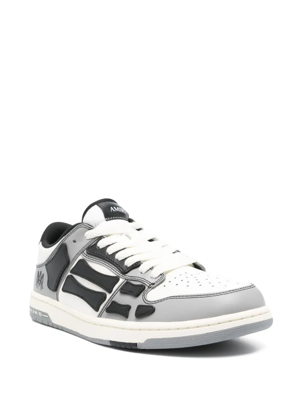 Amiri white and black lace-up low-top sneakers with perforated toe and bold side panels