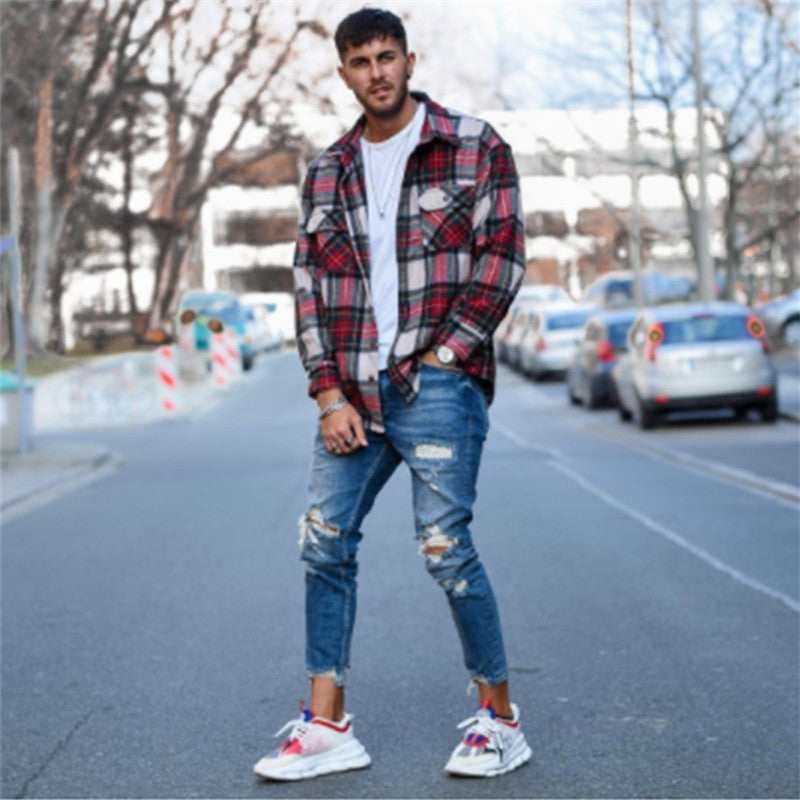 Men's deep blue ripped jeans, tapered fit with multiple knee and thigh rips