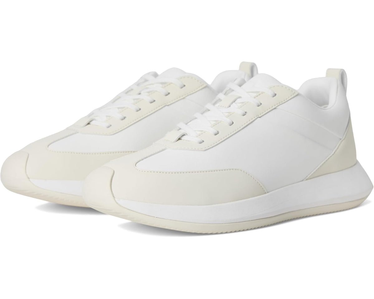 Unisex off-white low-top sneakers with lace-up closure and padded collar