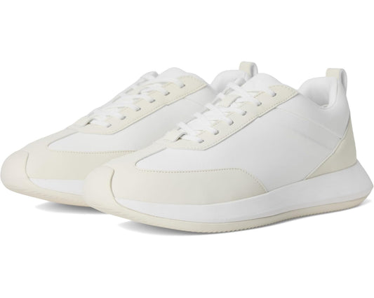 Unisex off-white low-top sneakers with lace-up closure and padded collar