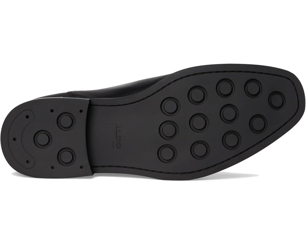 Black rubber outsole with circular traction grips