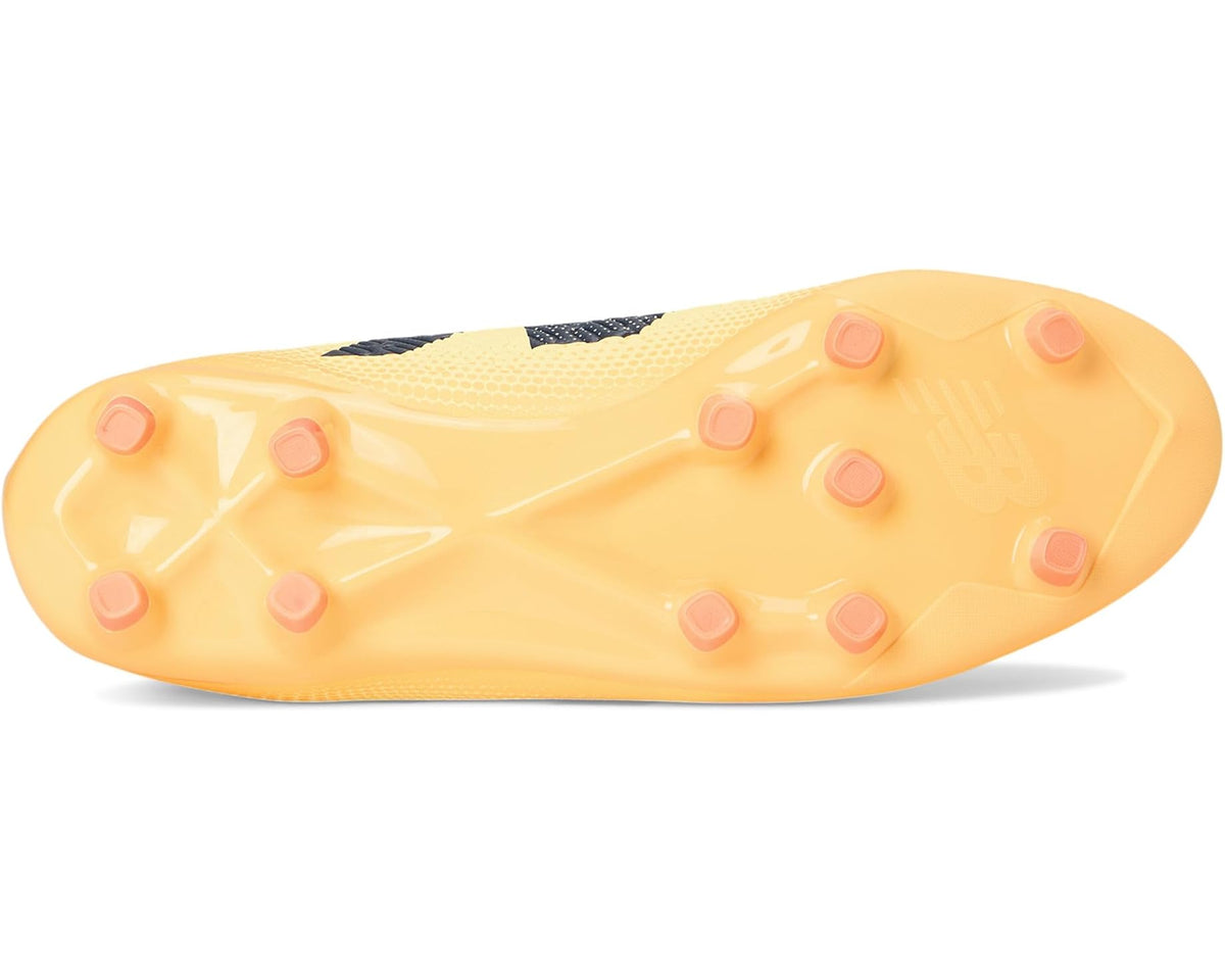 Light yellow FG soccer cleat outsole with pinkish-orange round studs