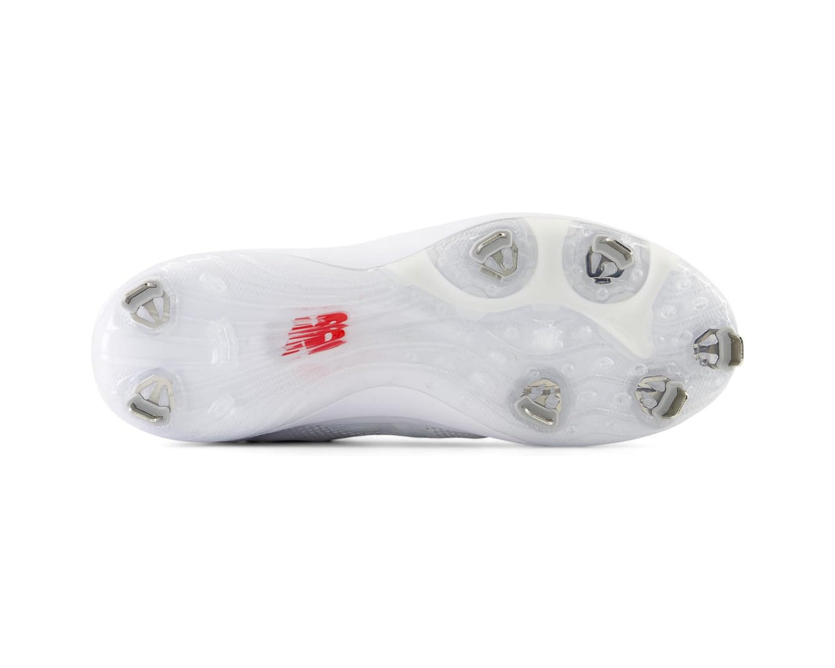 Men's New Balance FuelCell 4040 cleat outsole, white studs with metal plate details