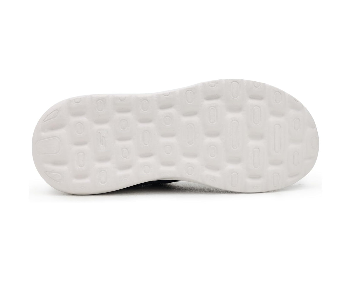 White rubber outsole with traction nubs for navy walking sneaker