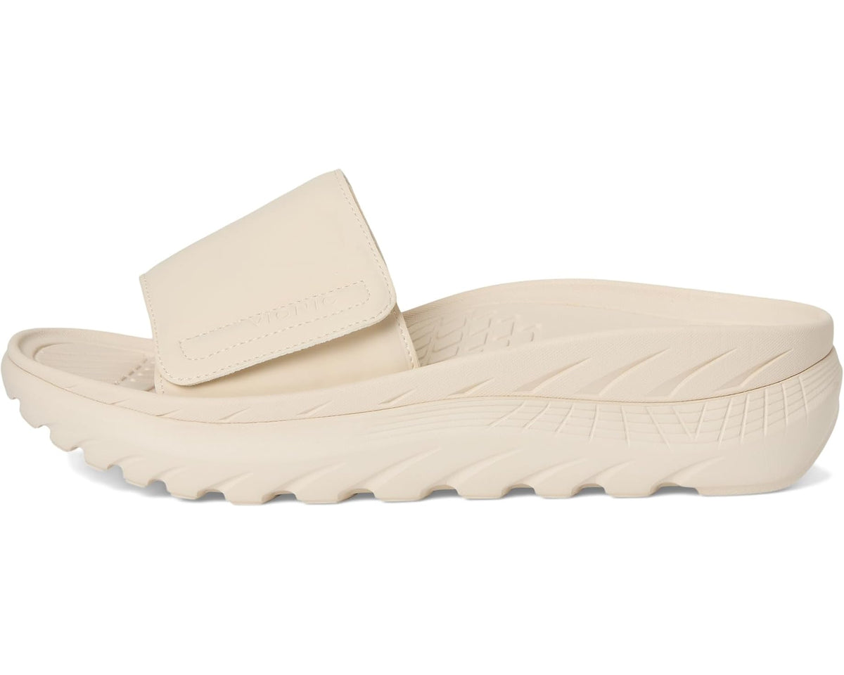 Cream slide sandal with wide strap and thick cushioned sole