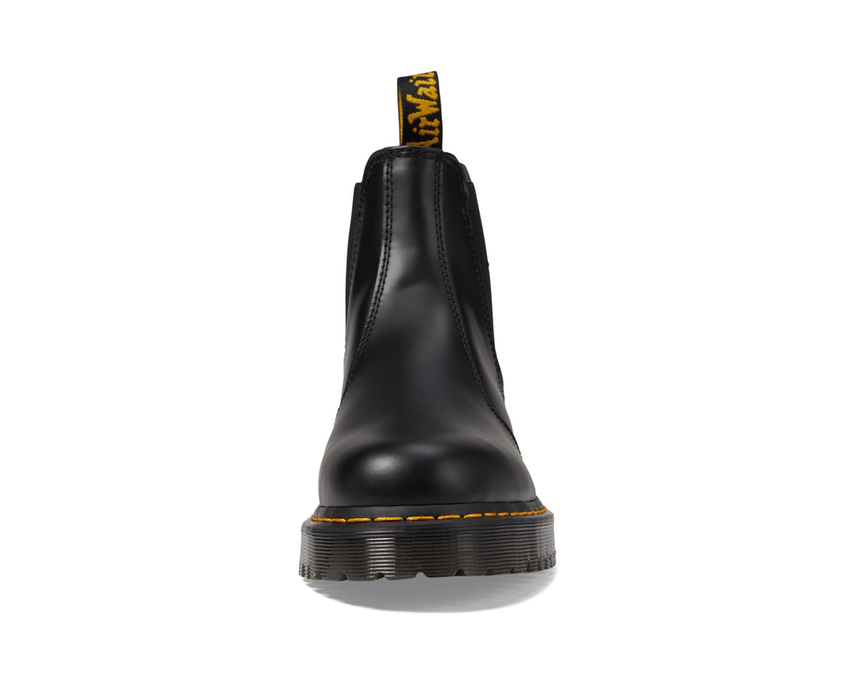 Black smooth leather chelsea boots, side view with pull tab and chunky tread sole